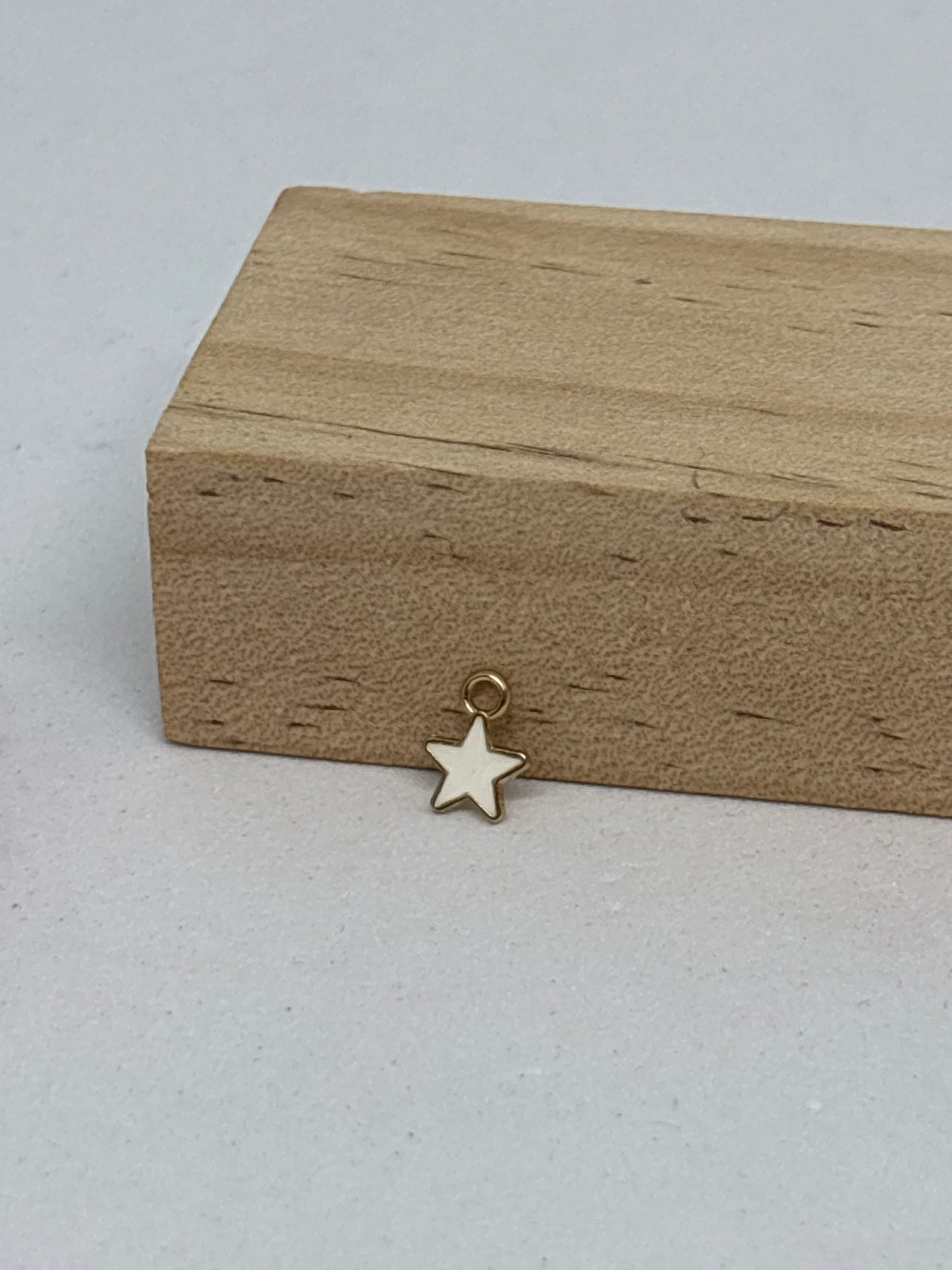 Breloque mini étoile 0,6cm - acier inoxydable ⭐️